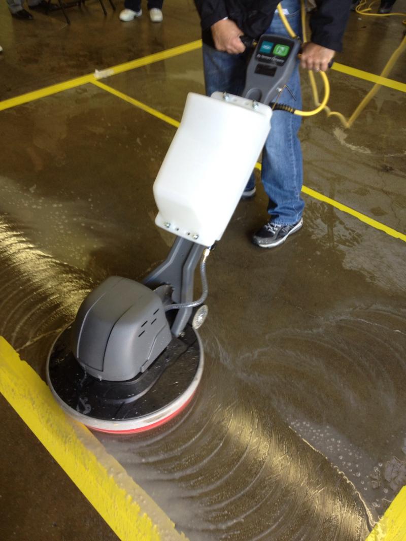 The first step in polishing concrete